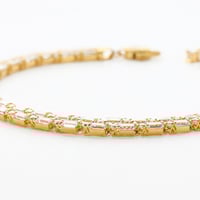 سحبة يد مزينة بالزركون وباجيت دورين 6.3 غرام عيار...