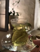 طقم لون اخضر مكون من 6 كاسه و 6 فنجان كريستال مع ص...