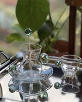 طقم لون اخضر مكون من 6 كاسه و 6 فنجان كريستال مع ص...