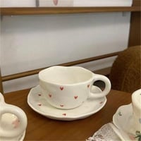 كوب سيراميك بصحن نقش قلوب