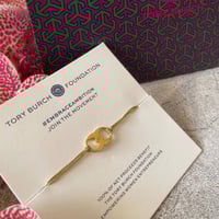 اسوارة توري بورش لون ذهبي