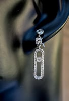 طقم سلسال و حلق M فضي