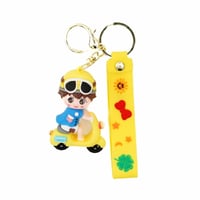 سلسلة مفاتيح برسوم كرتونية - دمية دراجة