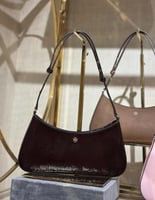 حقيبة tory burch عنابي