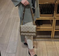 شنطة tory burch مع سترابين