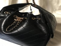 شنطة شانيل 25 اسود وذهبي - CHANEL