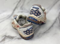 حذاء asics khan 8