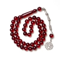 سبحة بكلايت احمر شفاف