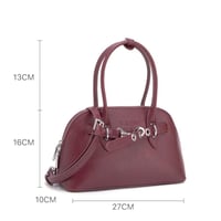 شنطة أريانا لون عودي