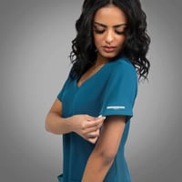 بلوزة سكيتشرز لون تركوازي | Bahama