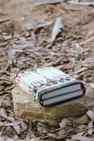 شنطة كُتب سجاد القط العسيري