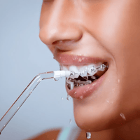 إم كو جهاز خيط مائي لتنظيف الاسنان