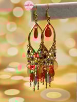 حلق الفنانة دينا الشربيني (ملوّن)