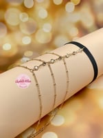 ربطة فخذ أنيقة (لون ذهبي)