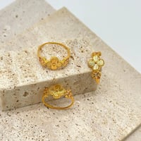 خاتم ناعم على شكل وردة ( 1.4 جرام - عيار 21 - RI03...