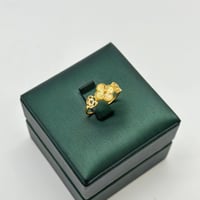 خاتم ناعم على شكل وردة ( 1.4 جرام - عيار 21 - RI03...