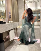 فستان سهرة اخضر تطريز كامل