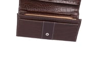 حقيبة نسائية جلد بني لامع — أناقة فاخرة بتصميم عمل...