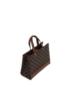 شنطة يد نسائية بني غامق – أناقة كلاسيكية بلمسة فاخ...