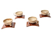 طقم أكواب قهوة سيراميك مع صحون – 4 قطع بتصميم أنيق