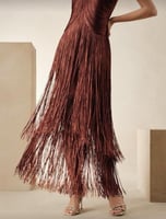 ستان أنيق متعدد الطبقات مزين بالأهداب الطويله وبدو...