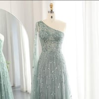 فستان سهرة جاهز من التول الفرنس الفاخر مشكوك بالخر...