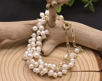 إسوره بأربع أدوار من اللؤلؤ الطبيعي وصناعه يدويه