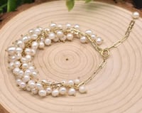 إسوره بأربع أدوار من اللؤلؤ الطبيعي وصناعه يدويه