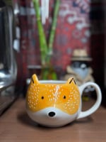 كوب الثعلب اللطيف