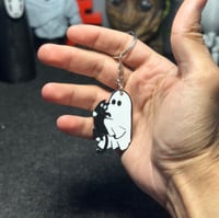 ميدالية “الشبح والقطة”