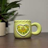 كوب قلب الطبيعة