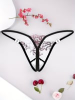 سروال داخلي بنقشه زهور بتصميم مقسم جريء، شفاف وعصر...