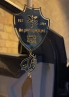 تعليقة نادي الاهلي بالشعار الجديد