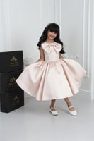 فستان بناتي ميكادو خربزي فيونكة على الصدر