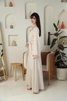 جلابية نسائية راقية كتان كلوش بلون بيج كريمي بتصمي...