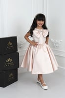 فستان بناتي ميكادو خربزي فيونكة على الصدر