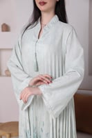 جلابية أنيقة مشجرة بلون نعناعي كسرات وكم طويل