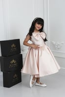 فستان بناتي ميكادو خربزي فيونكة على الصدر