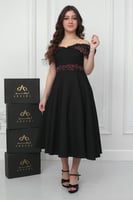 فستان نجلاء الراقي أسود مطرز .. فستان السن المحير