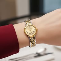 ساعة يد نسائية فضية ذهبية – تصميم فاخر، مقاومة للم...