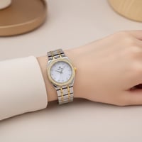 ساعة نسائية بفصوص زركون باللون الذهبي والفضي