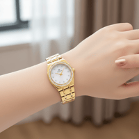 ساعة نسائية بفصوص زركون باللون الذهبي