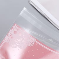 اكياس كوكيز كبير شفاف بخلفية زهري (100) كيس