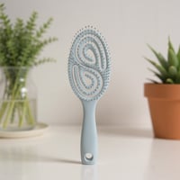 فرشاة شعر بتهوية