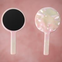 مرآة يد دائرية بنمط تموجات من سلسلة الوردي اللامع