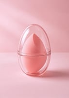 إسفنجة مكياج بتصميم قشر البيض (وردي)