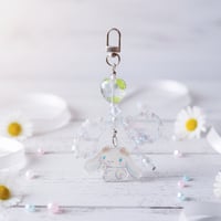 ميدالية أكريليك من سلسلة لغة الزهور هيلو كيتي والأ...