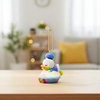 صندوق المفاجآت ميدالية من مجموعة بريق الثلج بطة دو...