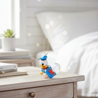 صندوق المفاجآت ميدالية من مجموعة بريق الثلج بطة دو...