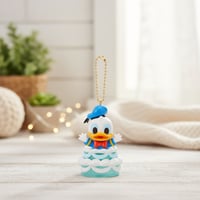 صندوق المفاجآت ميدالية من مجموعة بريق الثلج بطة دو...